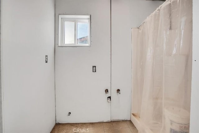 interior space featuring light tile patterned floors