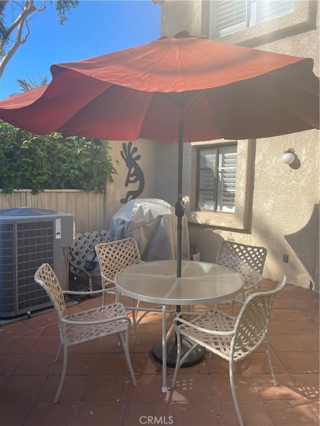 view of patio / terrace featuring grilling area and cooling unit