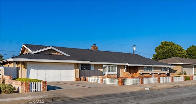 single story home with a garage