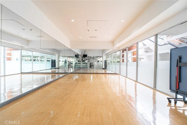 interior space with wood-type flooring and a wealth of natural light