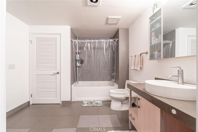 full bathroom featuring tile patterned flooring, vanity, toilet, and shower / bathtub combination with curtain