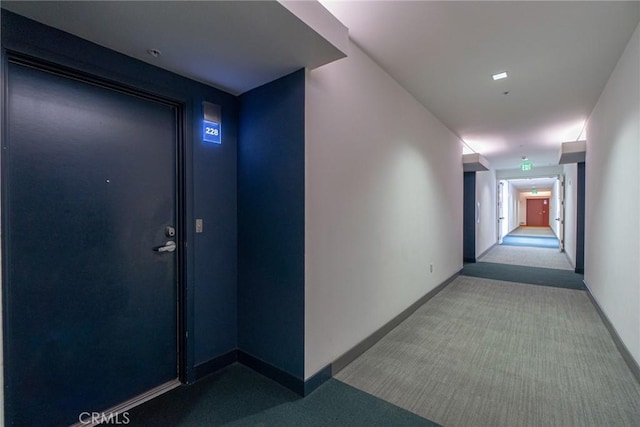 hallway with light carpet