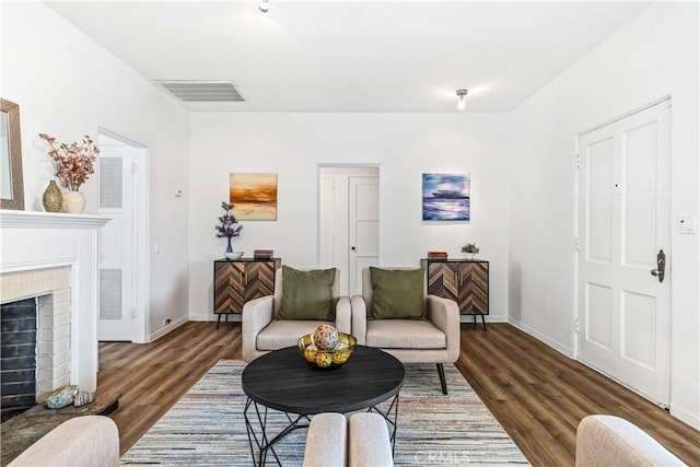 living room with dark wood-type flooring