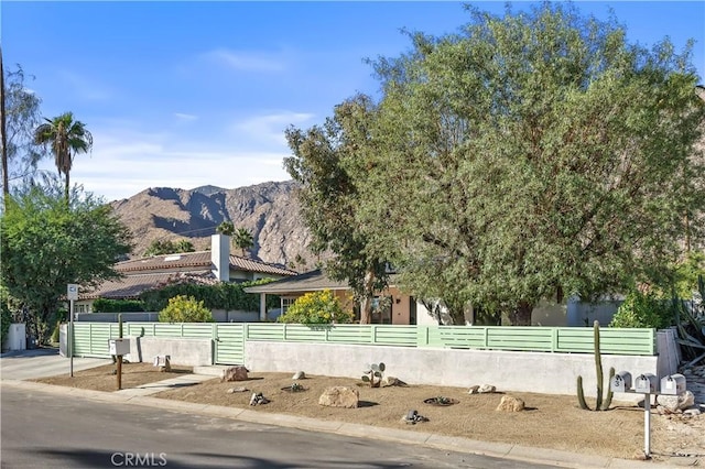 surrounding community featuring a mountain view