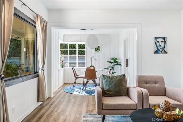 sitting room with hardwood / wood-style floors