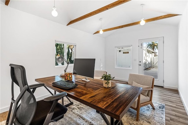 office space with hardwood / wood-style floors, lofted ceiling with beams, a wealth of natural light, and ceiling fan