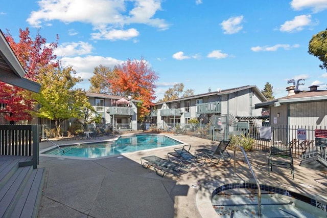 view of pool featuring a patio