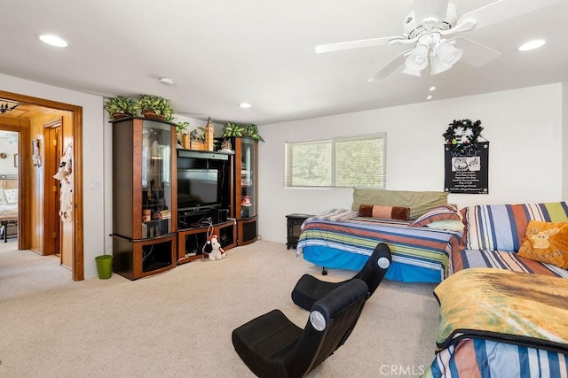 living room with carpet flooring and ceiling fan