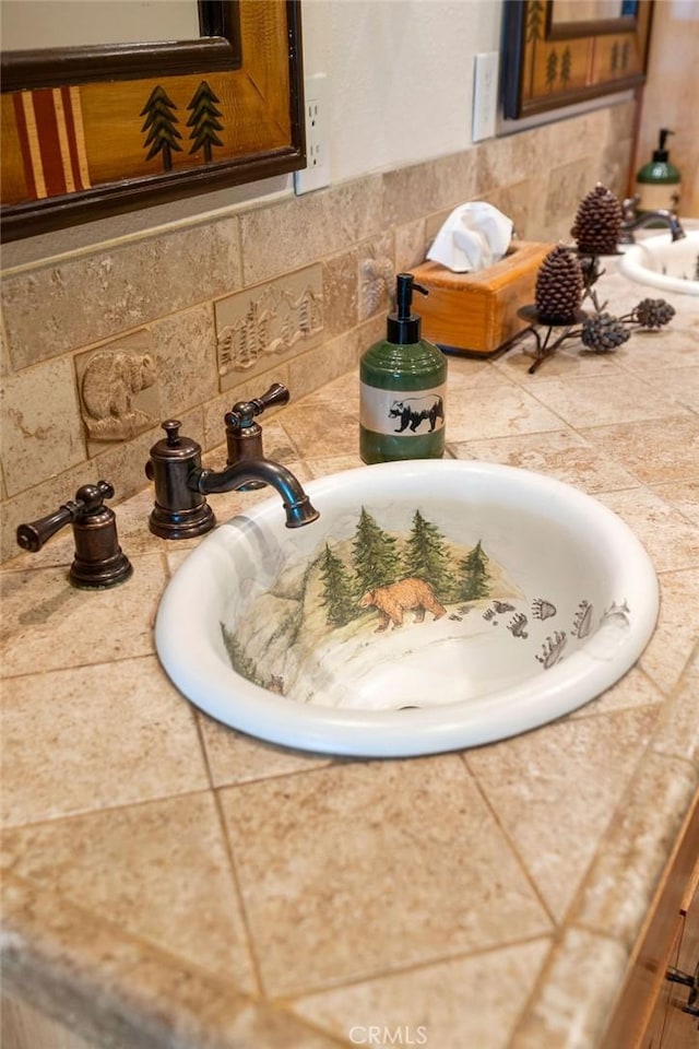 interior details with decorative backsplash and sink