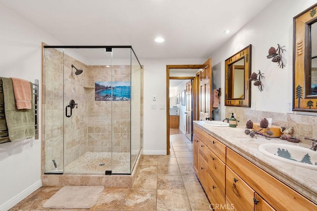 bathroom featuring vanity and walk in shower