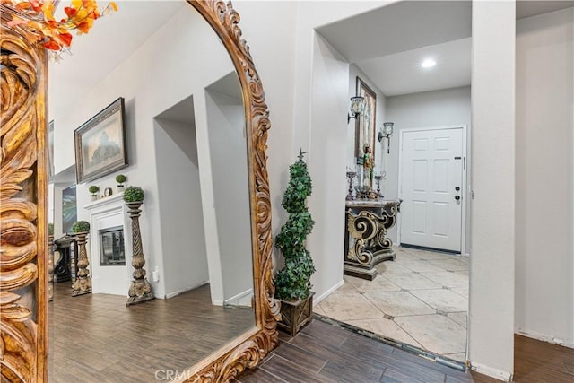 foyer featuring wood-type flooring