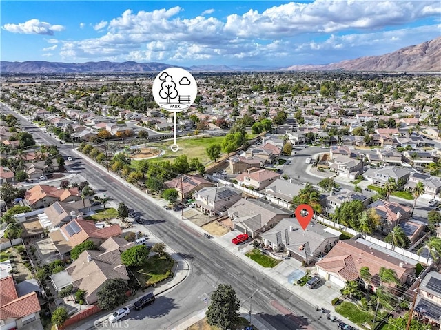 drone / aerial view featuring a mountain view