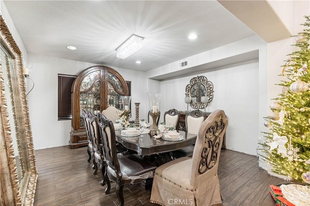 dining space featuring dark hardwood / wood-style floors