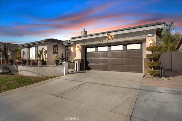 view of front of property featuring a garage