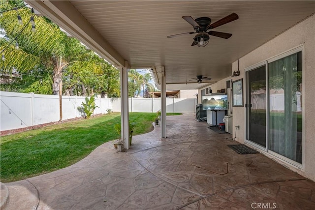 view of patio featuring ceiling fan