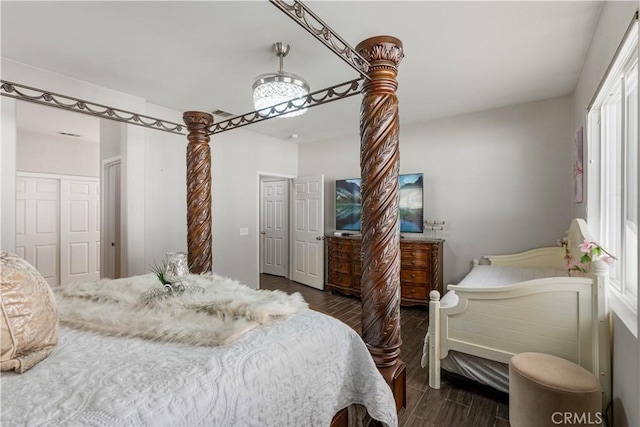 bedroom featuring dark hardwood / wood-style floors