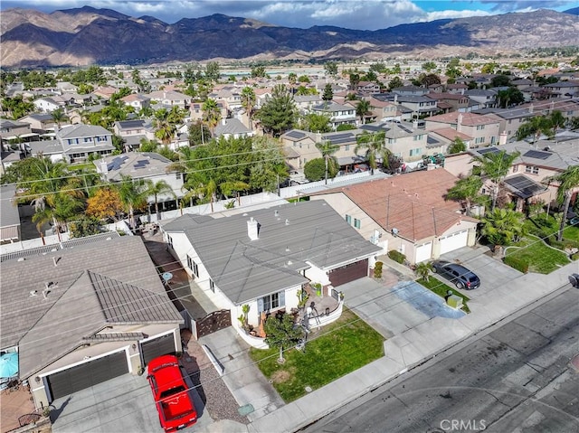 drone / aerial view featuring a mountain view