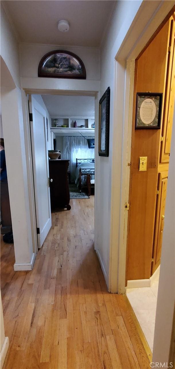 hallway featuring light wood-type flooring