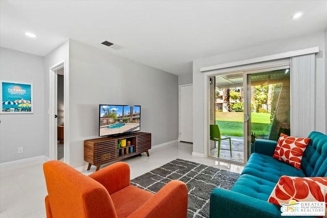 living room featuring plenty of natural light