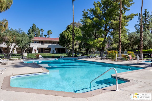 view of pool featuring a patio area