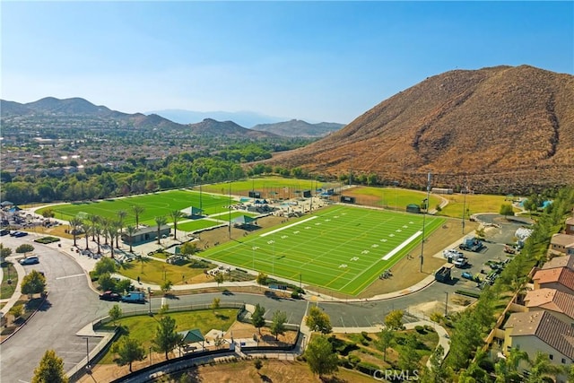 birds eye view of property with a mountain view