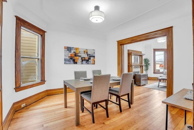 dining space featuring light hardwood / wood-style floors