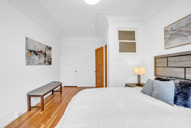 bedroom featuring hardwood / wood-style flooring