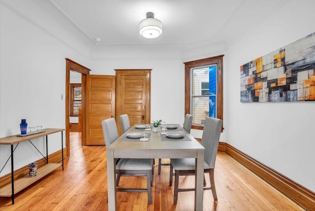 dining space featuring light hardwood / wood-style flooring