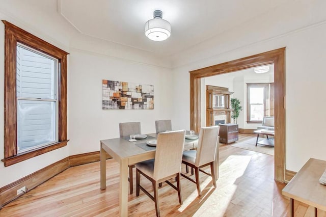 dining area featuring light wood-type flooring