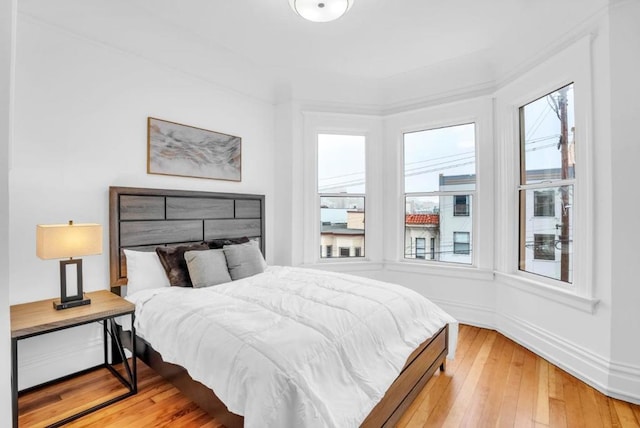 bedroom featuring hardwood / wood-style floors