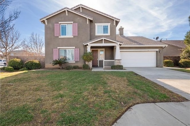 view of front of house with a garage and a front yard