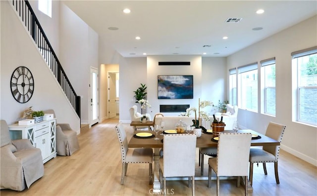 dining space featuring light wood-type flooring