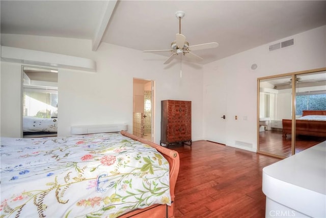 bedroom with lofted ceiling with beams, a closet, hardwood / wood-style flooring, and ceiling fan