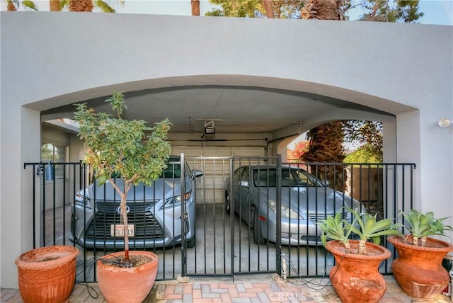 view of gate with a carport