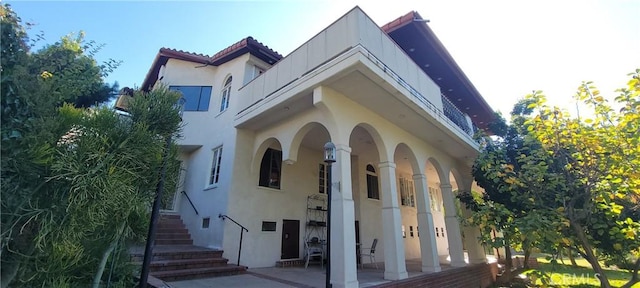 view of home's exterior featuring a patio area