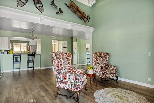 living area featuring hardwood / wood-style flooring