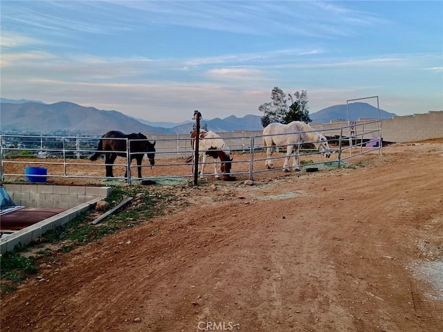 exterior space with a mountain view and a rural view