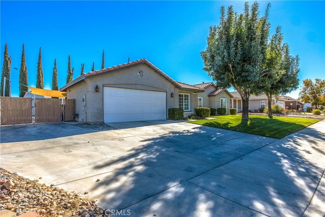 ranch-style house with a front yard and a garage