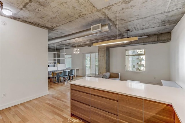 kitchen with light hardwood / wood-style floors