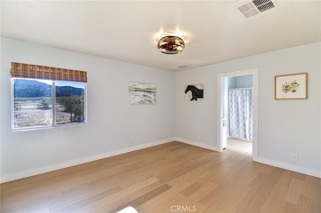 empty room featuring light hardwood / wood-style floors