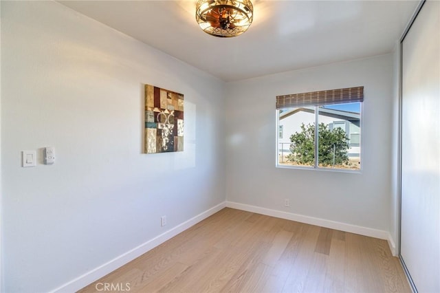 empty room featuring light hardwood / wood-style floors