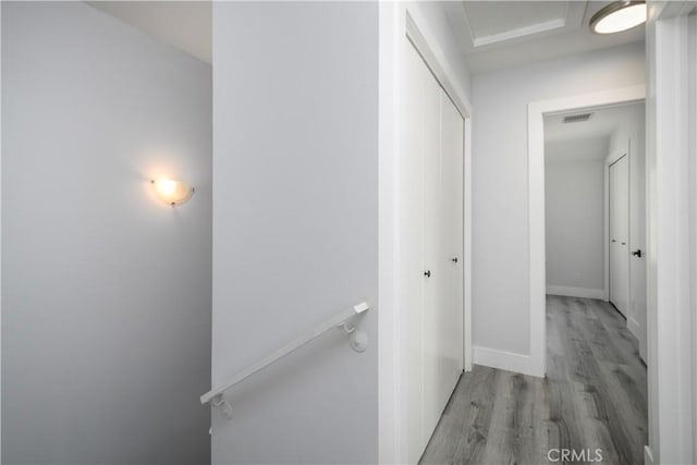 corridor featuring light hardwood / wood-style floors