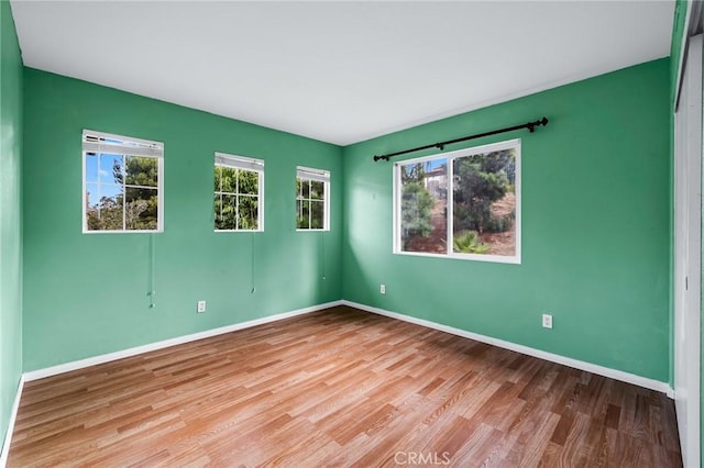 empty room featuring light hardwood / wood-style floors