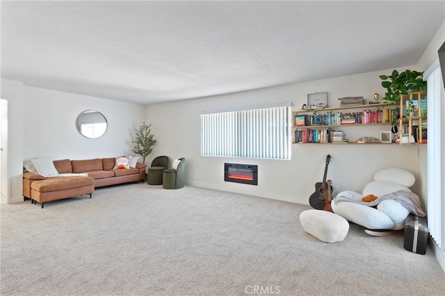 living room with carpet and a healthy amount of sunlight