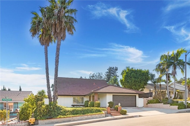 single story home with a garage