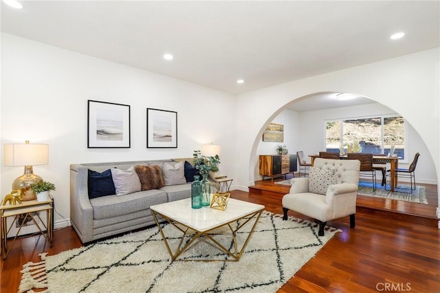 living room with dark wood-type flooring