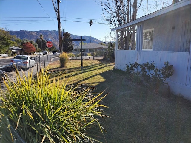 view of yard with a mountain view