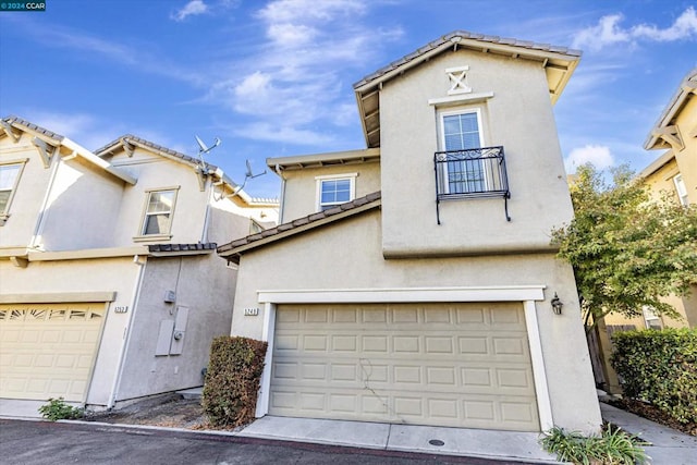 view of front of property with a garage