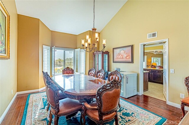 dining space featuring a notable chandelier