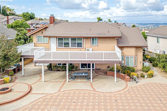 back of house featuring a patio